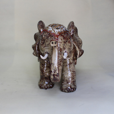 鎮(zhèn)宅高檔風(fēng)格工藝 窯變陶瓷大象擺件的吉祥魅力